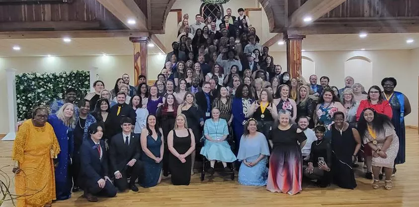PTK member group photo on staircase